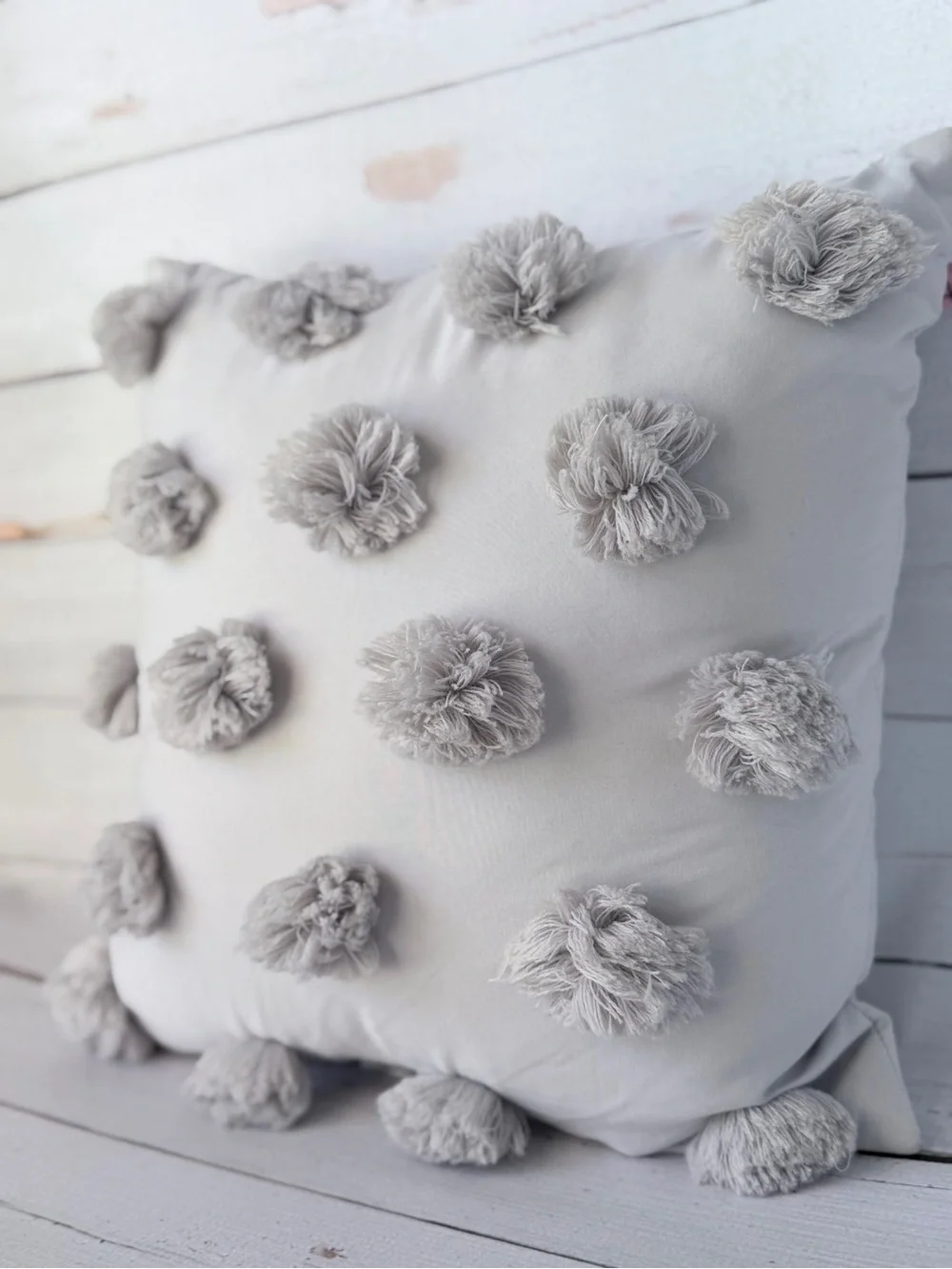 Pom Pom Decorative Throw Pillow in Light Gray